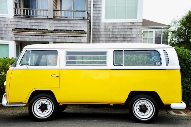 Classic yellow vintage camper van profile
